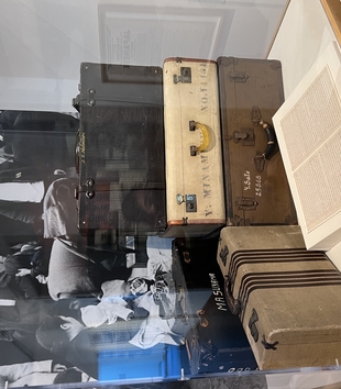 Exhibit of Suitcases brought by Japanese Americans to WWII Incarceration Camps on display at JANM