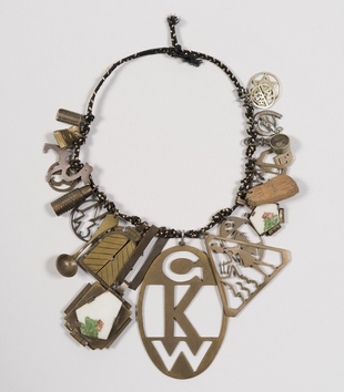 Bracelet consisting of pendants made of brass, porcelain, and cord