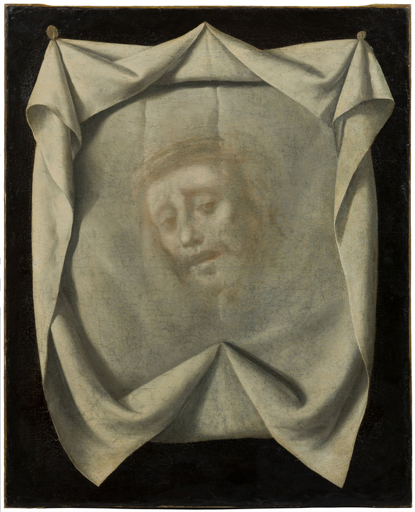 An oil painting depicts the veil of Veronica as a white cloth against a dark background. The textile is pinned up and falls in complicated folds. At its center is Christ's face. He has a pained expression with a half open mouth and puffy eyelids.