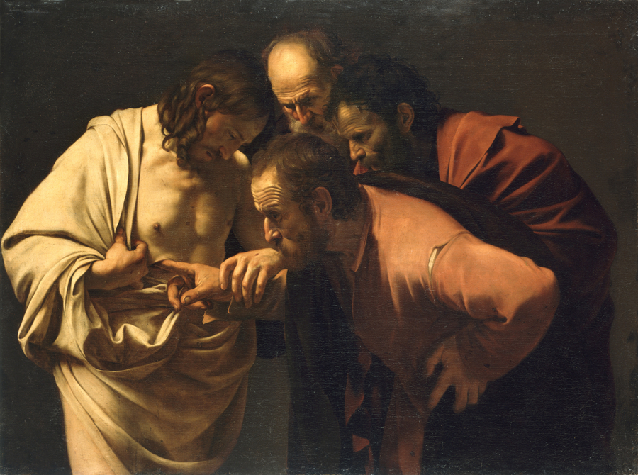 In this dramatically lit oil painting, three older robed men gather around a young, beared man. He pulls open his white robe to reveal his chest and guides the hand of one man into a wound there. The whole group stares down at the searching finger.