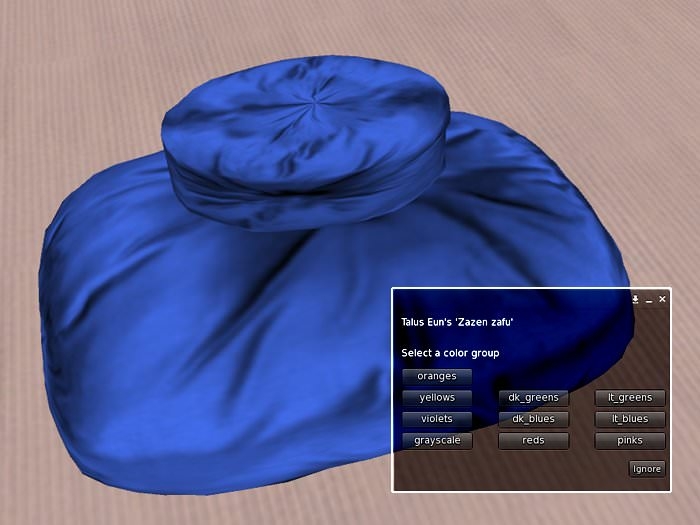 In this digital image, an oblong blue cushion is overlaid with a computer window that prompts the selection of a color group. The window headline reads, "Talus Eun's 'Zazen zafu.'"
