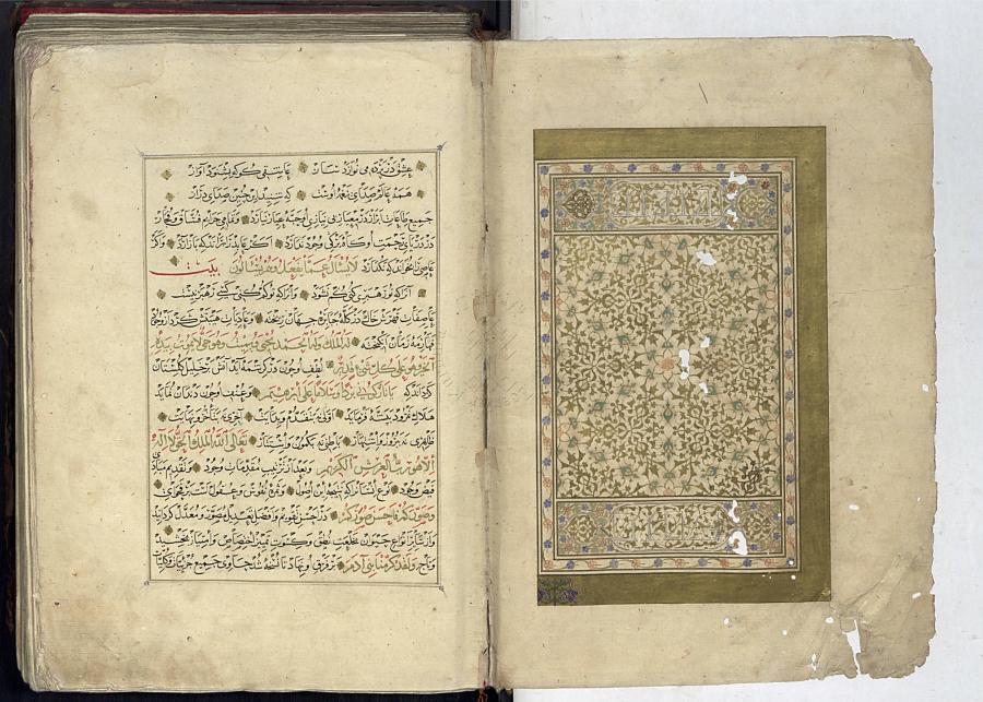The left page of an open Islamic manuscript is filled with Arabic calligraphy in black, red, and gold ink. The right page has an unfinished illumination with an incomplete border and outlines.